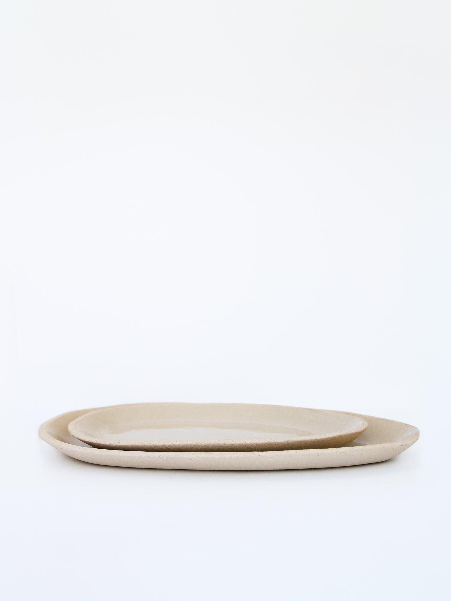 Serveerbordjes ruw beige