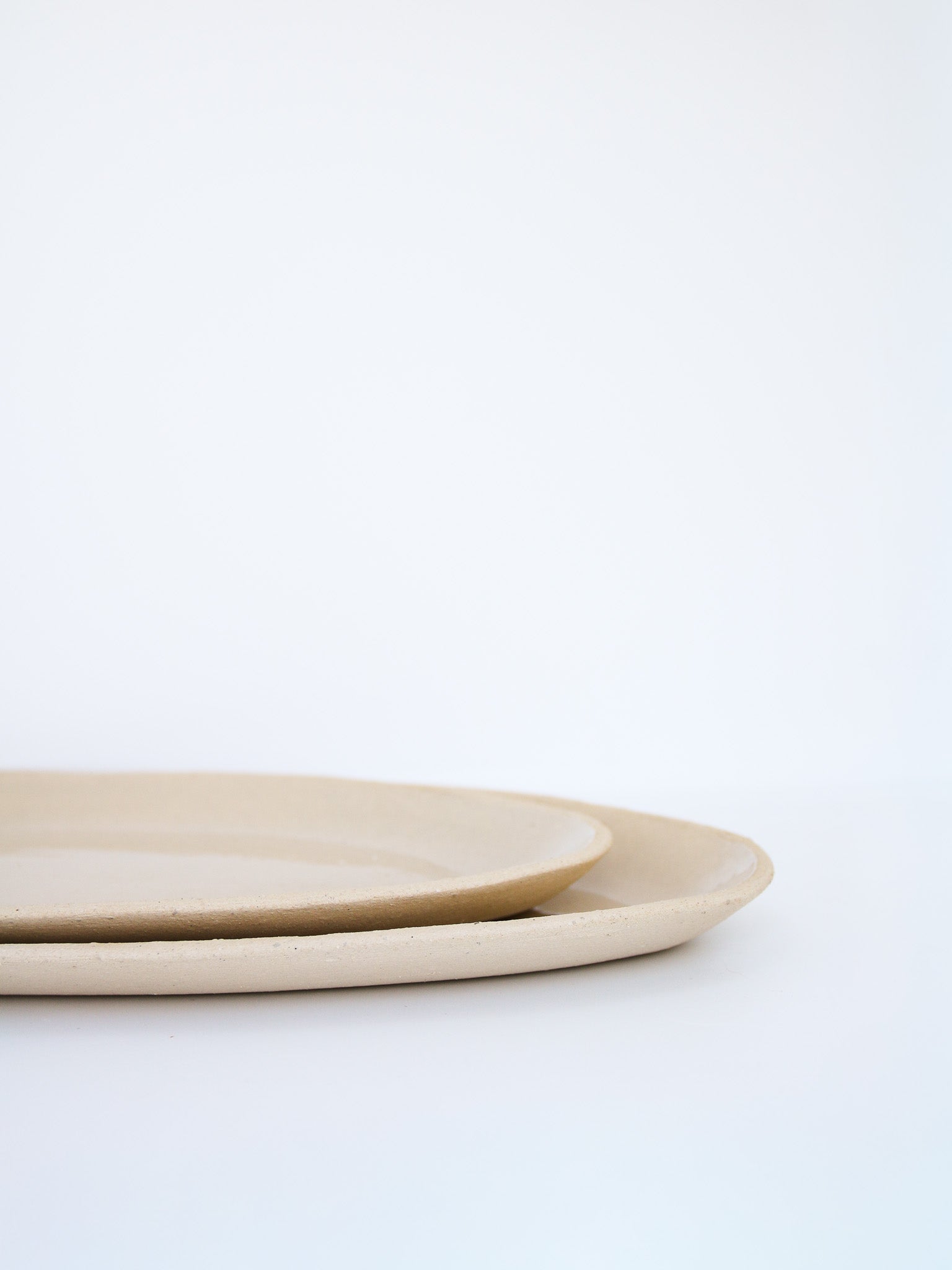 Serveerbordjes ruw beige